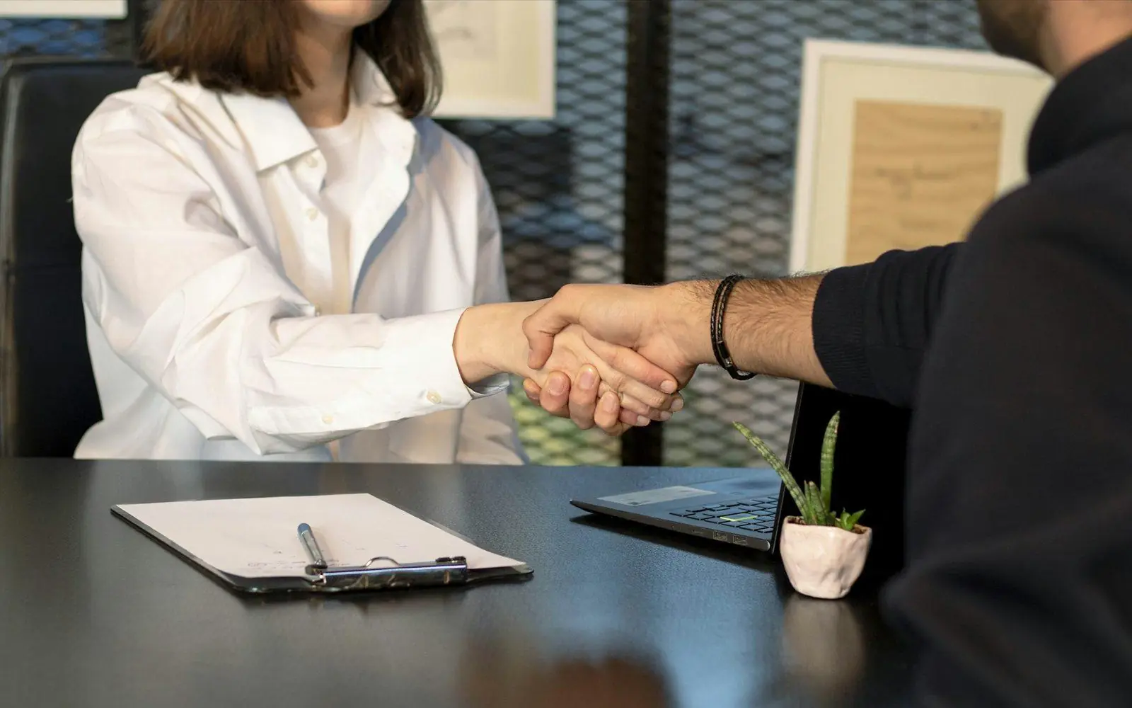 A handshake at handover